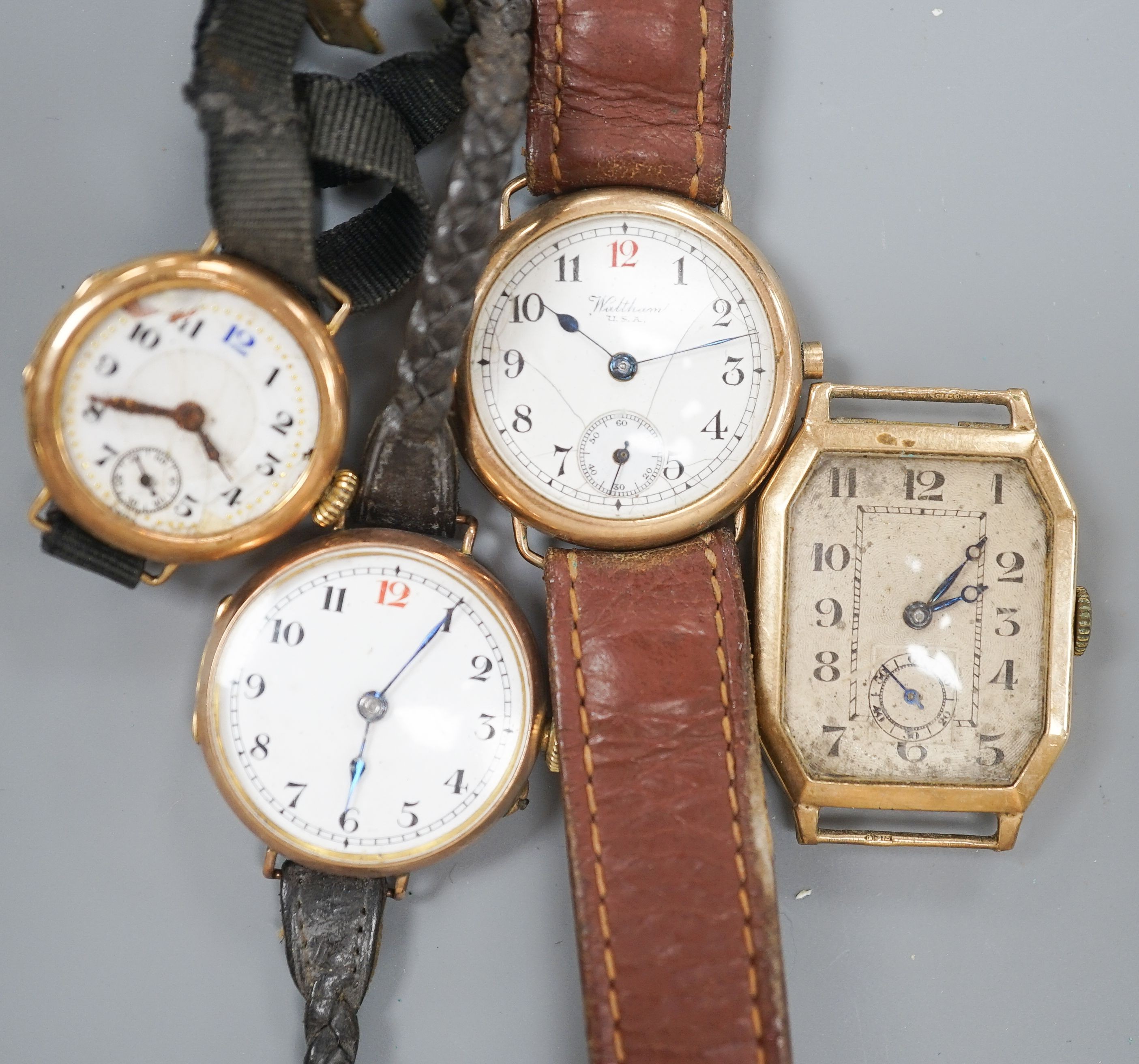 Four assorted early 20th century 9ct gold manual wind wrist watches, all a.f.